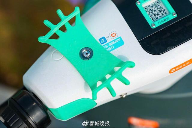 机支架”再升级提升昆明用户骑游体验爱游戏ayx网站滴滴青桔电单车“手(图2)